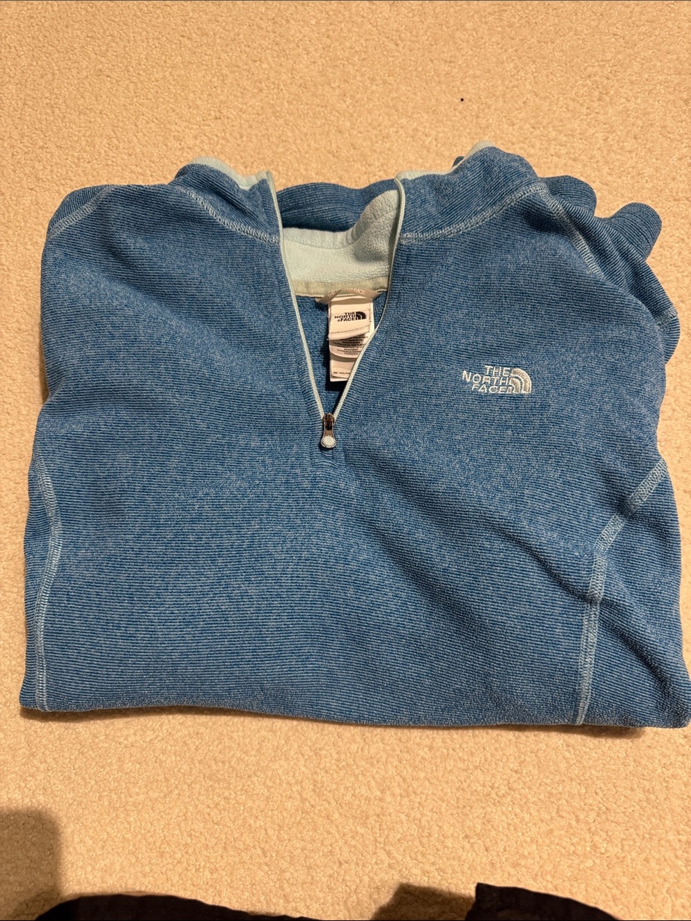 The North Face Woman’s Blue Quarter-Zip Sweater